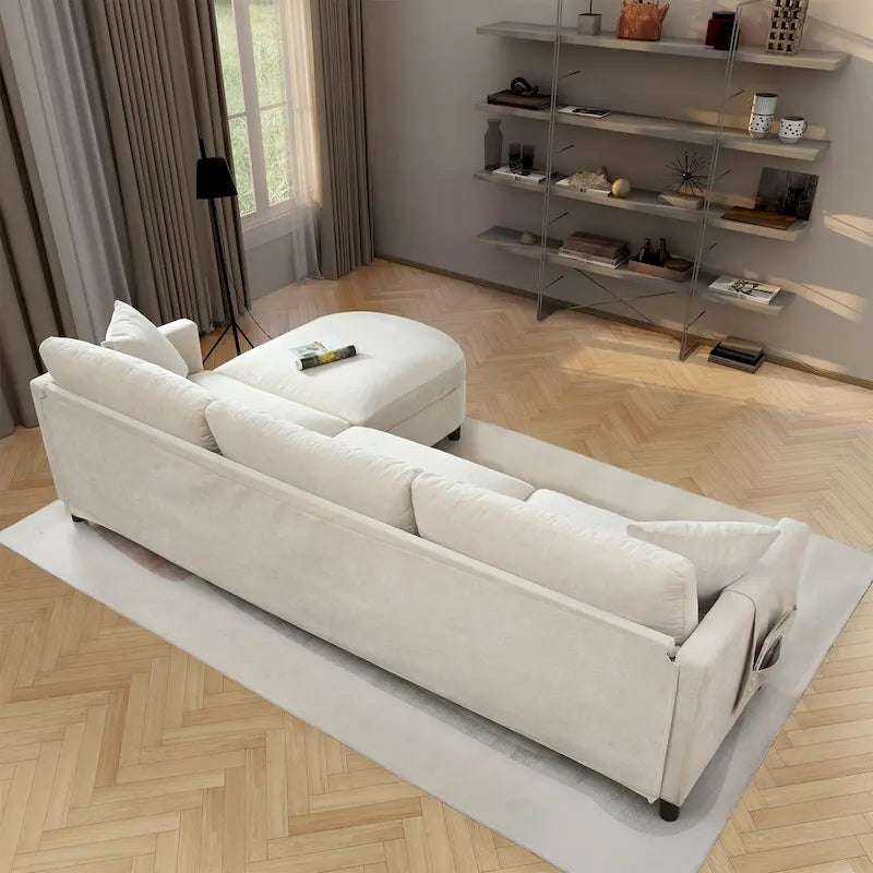 Canapé 4 places en tissu beige avec pouf amovible